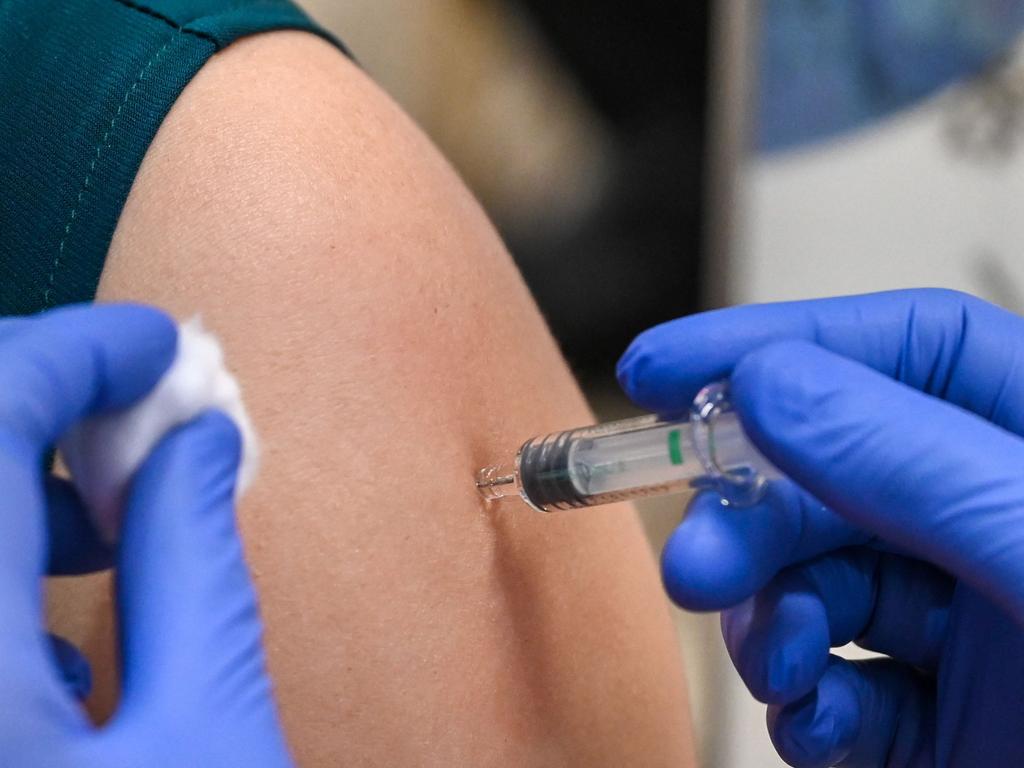 A woman receives coronavirus vaccine in Singapore. Picture: AFP