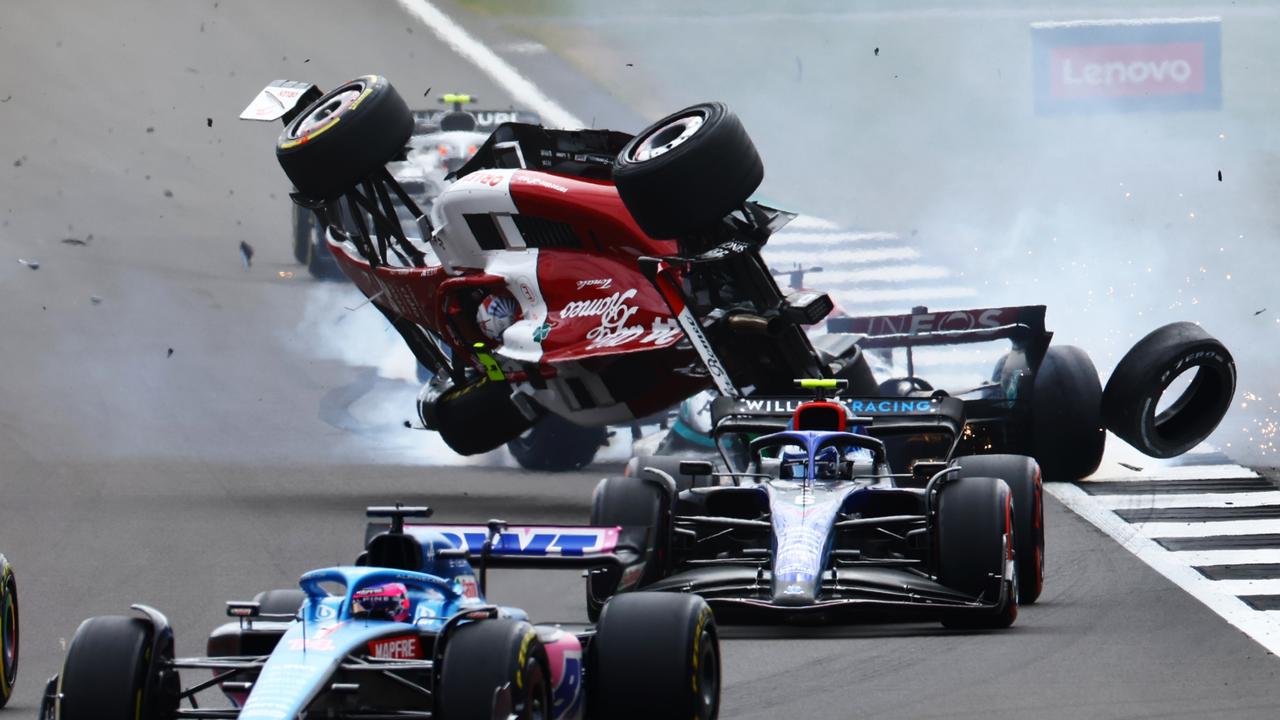 Zhou Guanyu’s goes aerial on the opening corner at Silverstone. (Photo by Mark Thompson/Getty Images)