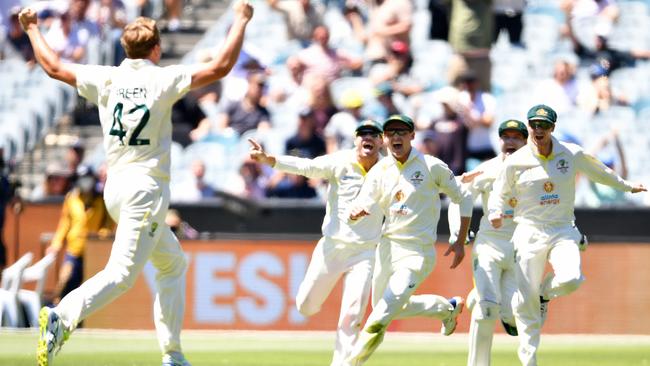 The Australians celebrate the moment the Ashes were retained before lunch on day three after Cameron Green, left, took the final English wicket for a total of just 68 runs. Picture: AAP