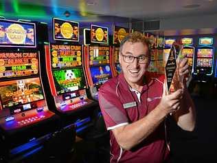 JACKPOT: Coolum Surf Club general manager Mal Wright with their state award. Picture: Patrick Woods