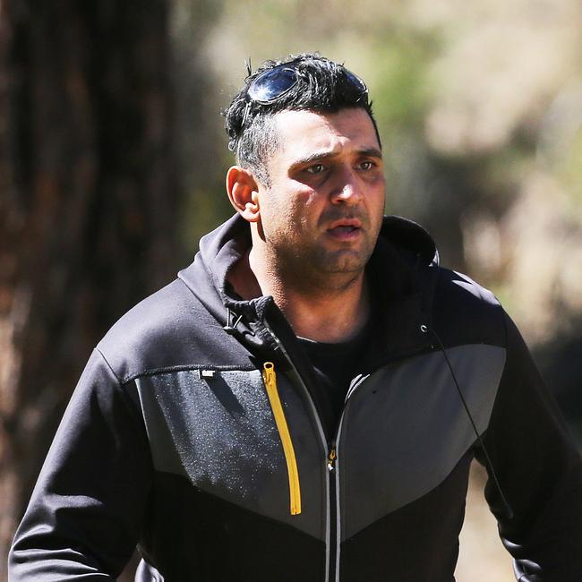 Anthony Elfalak runs to the scene where AJ was found alive yesterday. Picture: NCA NewsWire / Peter Lorimer.