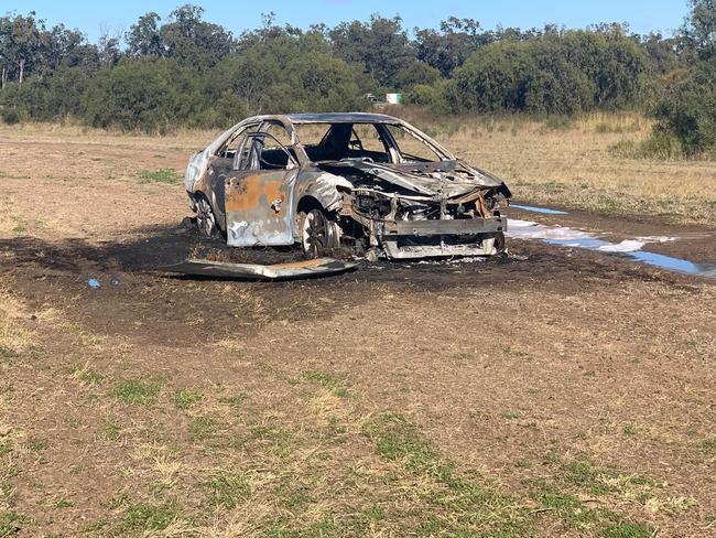 Chinchilla police are investigating a suspected arson after a ‘stolen’ car was found burning in a paddock. Photo/Ella Johnson-Carter.