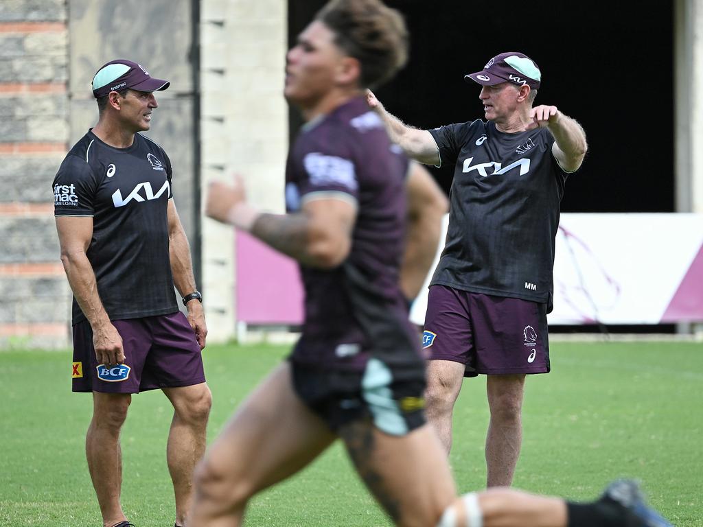 Trent Barrett and Michael Maguire watch over Broncos training. Picture: Lyndon Mechielsen/Courier Mail