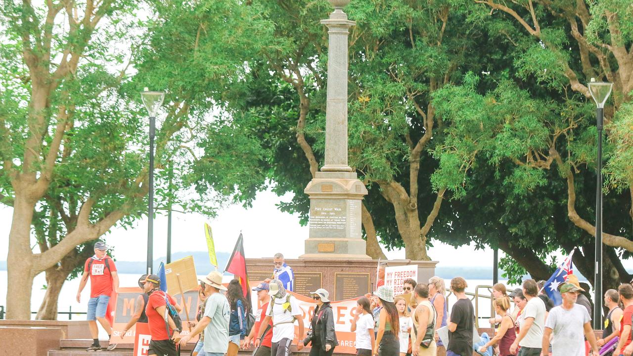 Marchers congregate at the cenotaph at an Anti Mandate March in Darwin Picture: Glenn Campbell