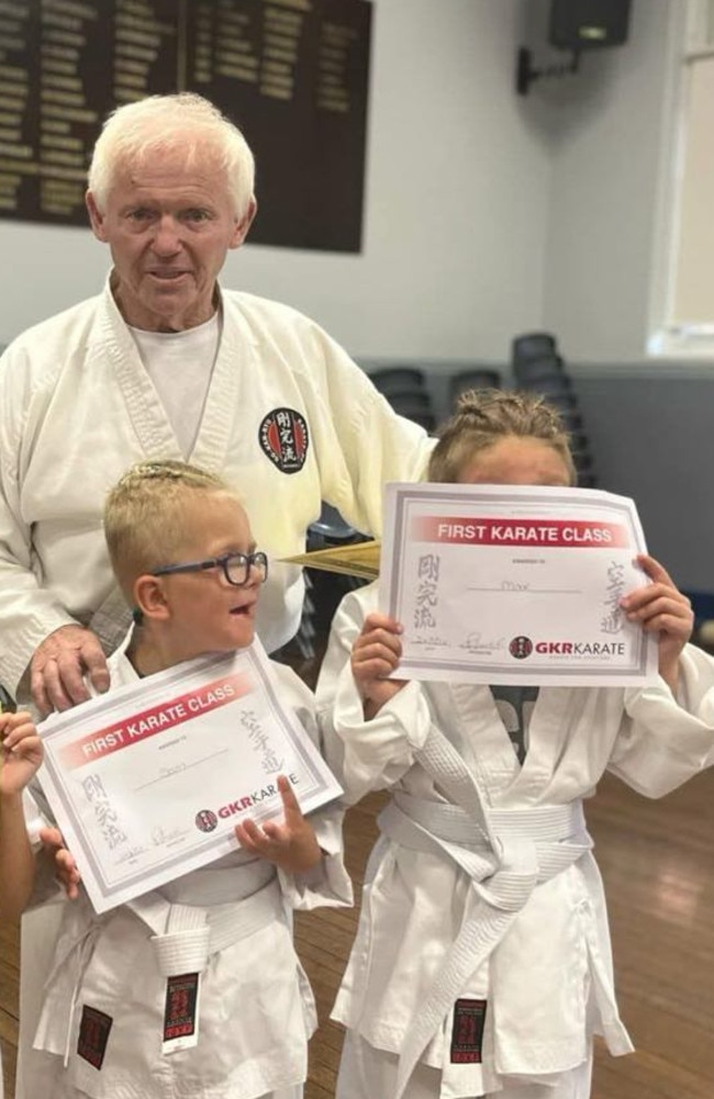 Sam, 6, and his brother Max, 7, with their karate instructor Peter. Pic: Supplied