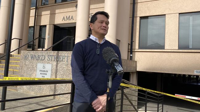 AMA SA President Dr Chris Moy speaking outside the scene of the arson attack. Picture: Gabriel Polychronis