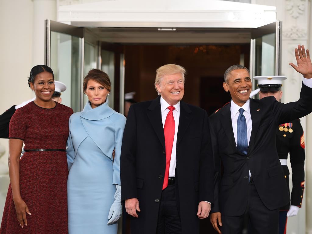 There will be no polite yet awkward greetings between the outgoing and incoming president as seen in 2017 with Barack and Michelle Obama. Picture: AFP Photo / Jim Watson