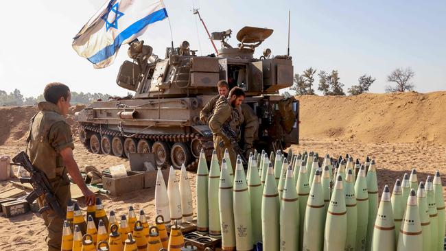 An Israeli artillery crew prepares shells near the border with the Gaza Strip. Picture: AFP