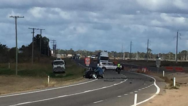 A car and a truck collided on the Bruce Highway this afternoon, killing an Ayr man.