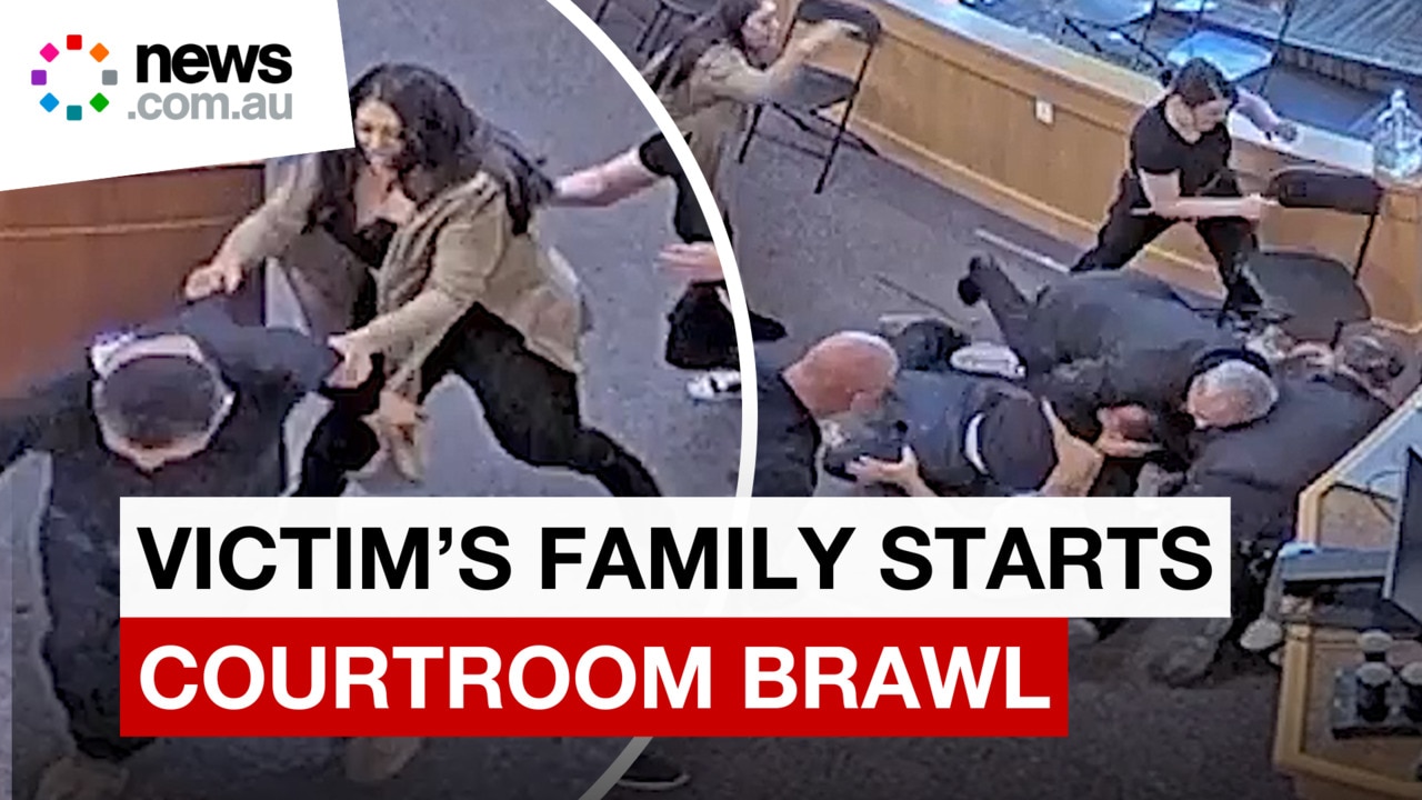 Wild footage of victim's uncle attacking murder suspect in court