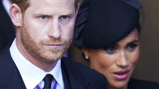 Prince Harry and Meghan will have to walk behind George, 9, and Charlotte, 7. Picture: Danny Lawson / POOL / AFP