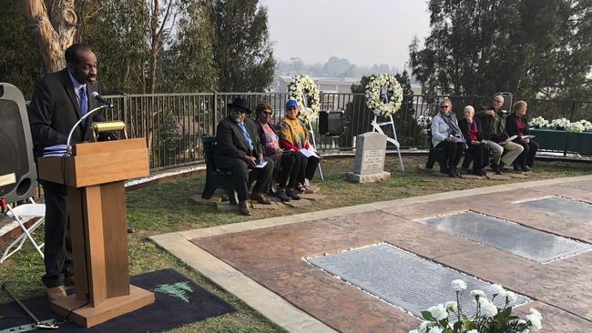 Jim Jones Jr, the adopted son of the Rev. Jim Jones, speaks to a service for the 40th Jonestown anniversary at Evergreen Cemetery in Oakland. Picture: AP