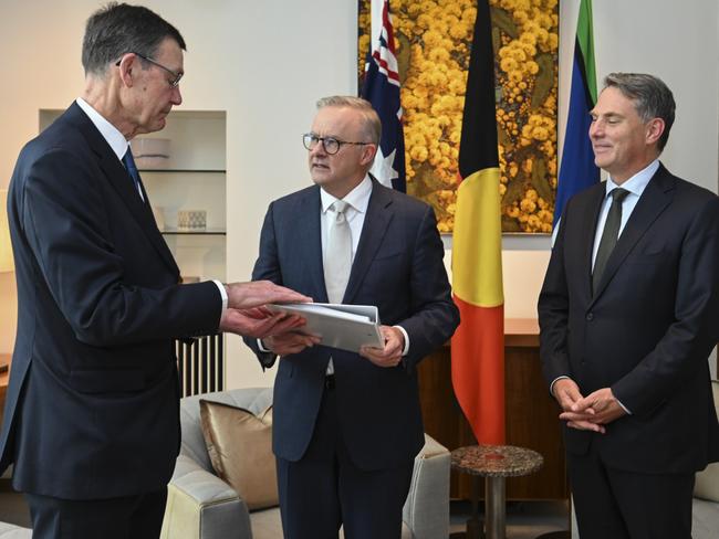 Sir Angus Houston delivers the Defence Strategic Review to Prime Minister Anthony Albanese and Defence Minister Richard Marles. Picture: Getty Images