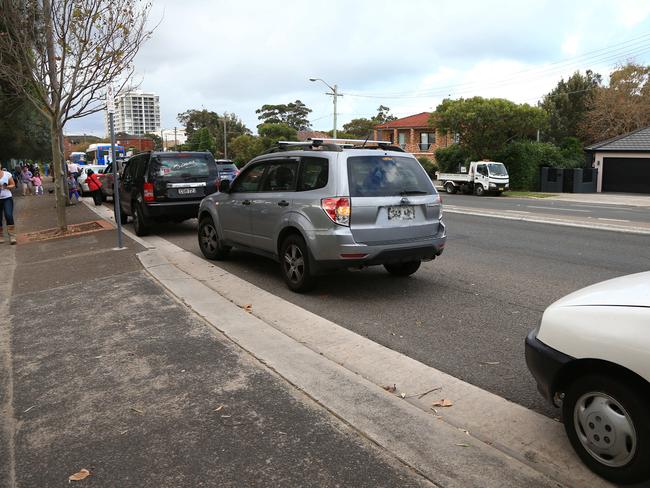 People doing the wrong thing in school zones out the front of Matraville Primary School.