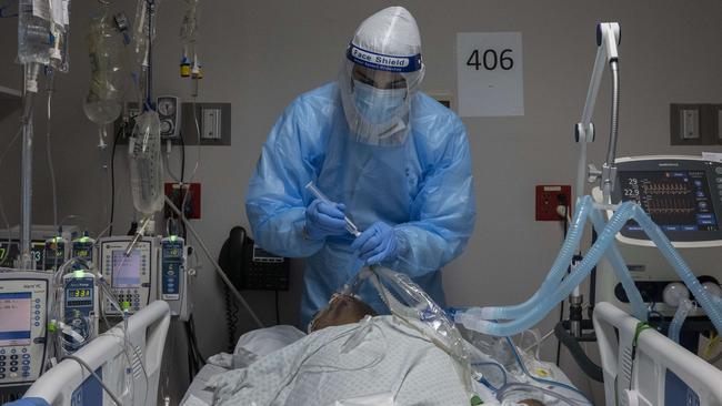 A medical staffer member treats a patient suffering from coronavirus in the COVID-19 intensive care unit (ICU) at United Memorial Medical Centre in Houston, Texas. Picture: Go Nakamura/Getty Images/AFP