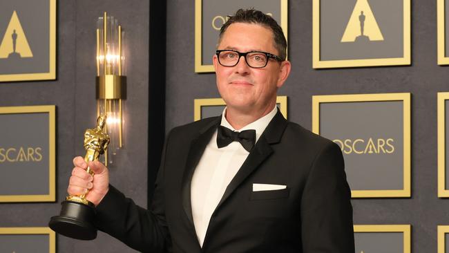 Australian cinematographer Greig Fraser with his Oscar for Dune. Picture: Getty Images