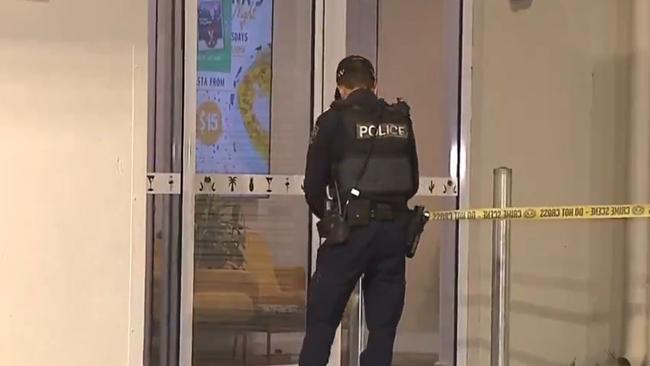 Police outside the Peninsula Hotel at Taperoo after the alleged assault. Picture: 7NEWS