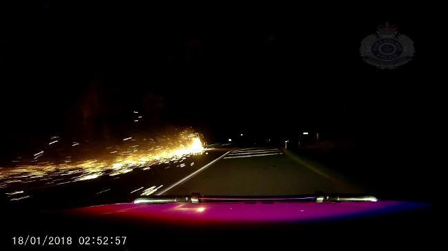 Police dashcam captures a fully-ablaze trailer driven along the Bruce Highway