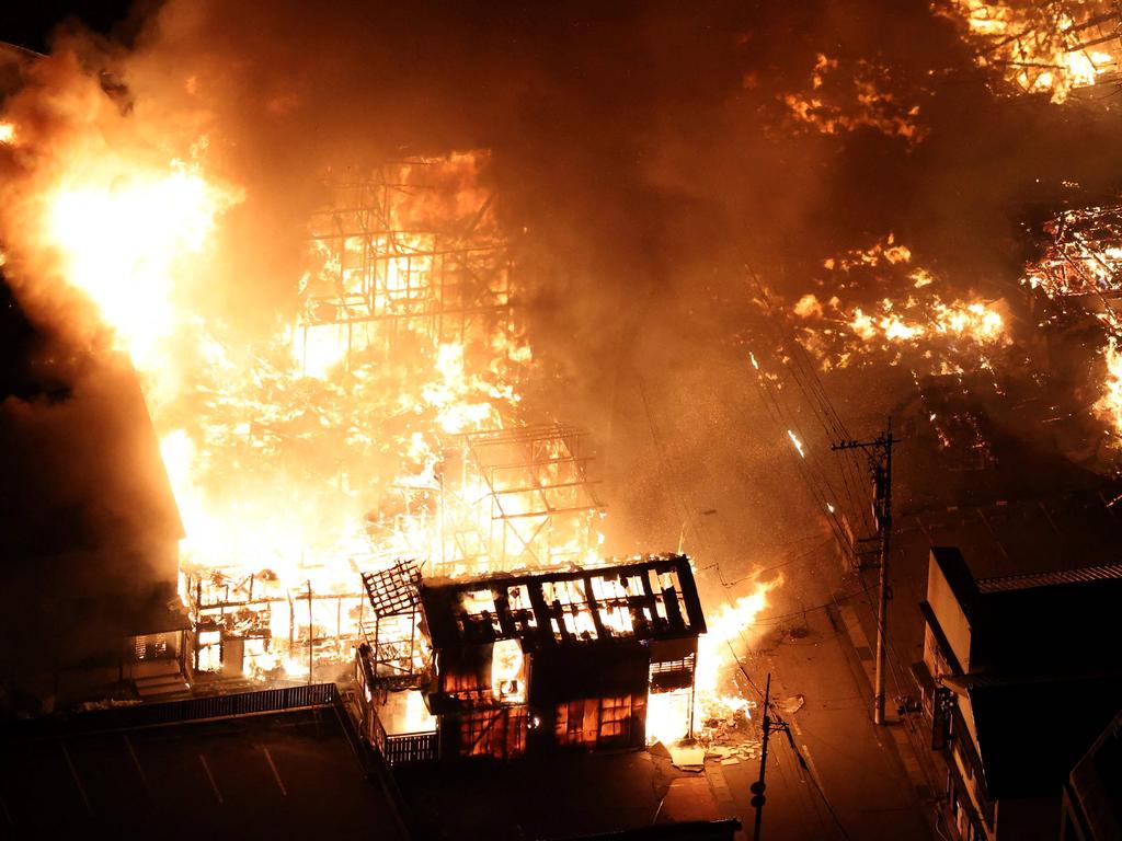 Buildings burning in the city of Wajima, Ishikawa prefecture on January 1, 2024, after a 7.5 magnitude earthquake struck the Noto region. Picture: AFP