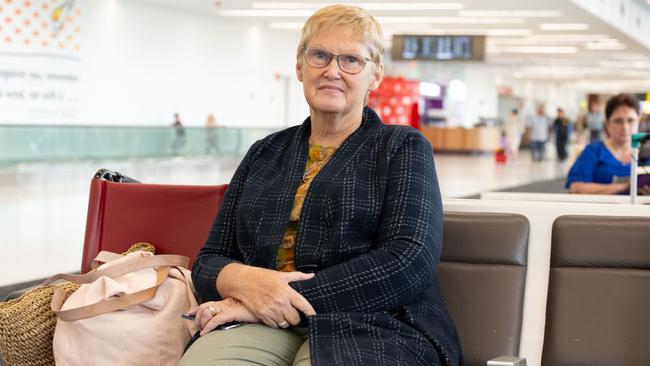 Alison Vaughan waiting for a delayed flight at Adelaide Airport on Christmas Day. Picture: The Advertiser / Morgan Sette