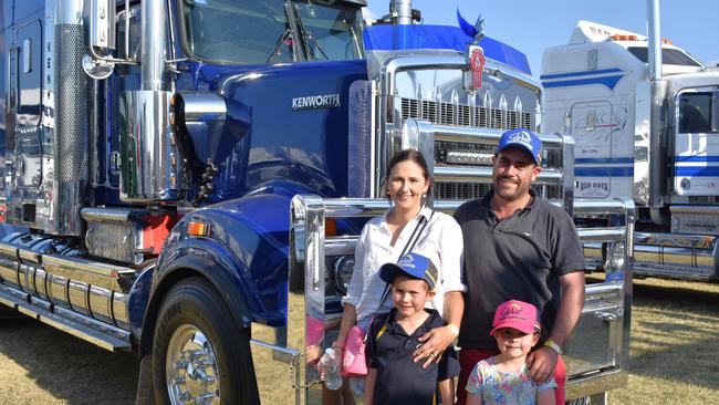 The Willett family looking at the impressive convoy of trucks at Gatton during the 2023 Lights on the Hill Trucking Memorial event.