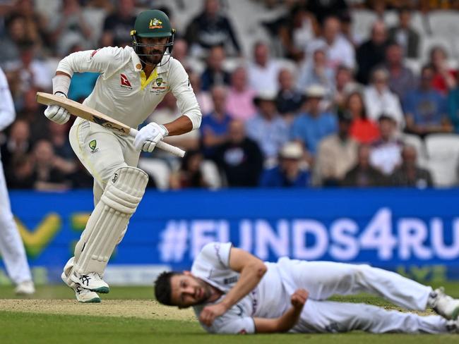 Mitchell Starc smacks a four with wife Alyssa Healy’s bat. Picture: Paul Ellis/AFP