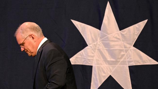 Scott Morrison leaves departs the stage at a Liberal election night event in Sydney after losing the Australian general election on May 21, 2022. Picture: AFP