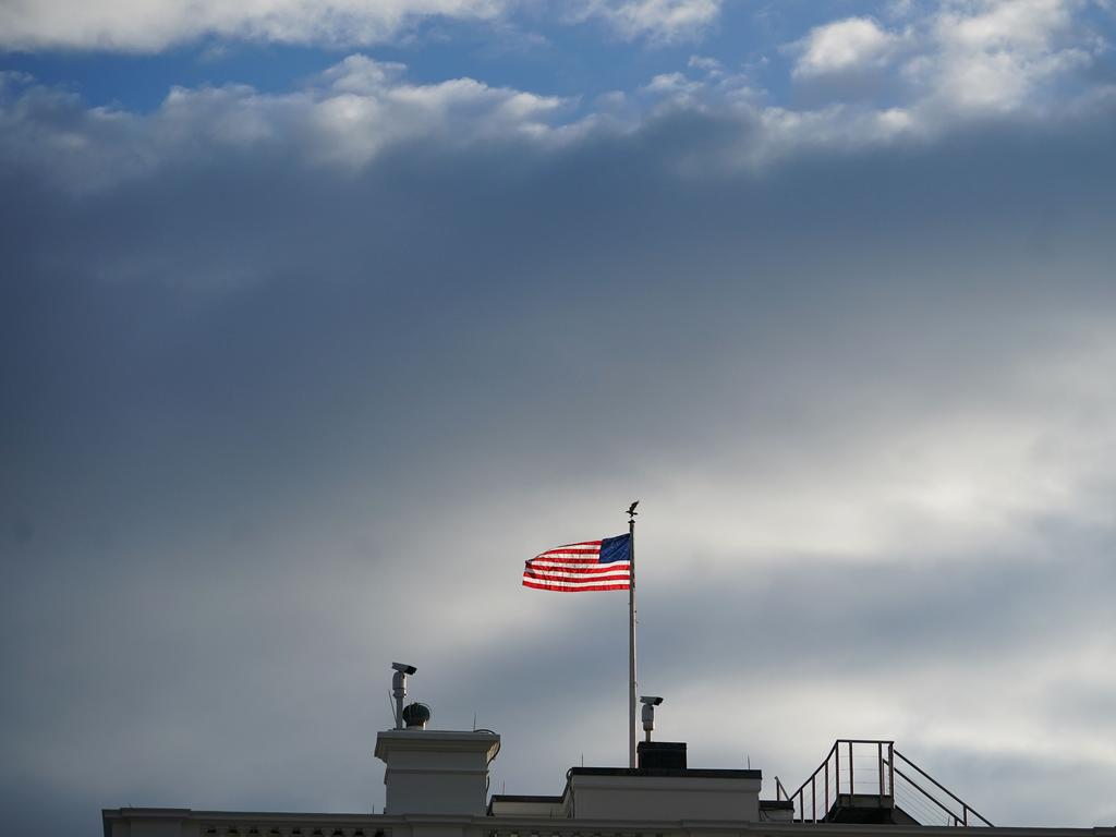 A US flag flies above the White House on Tuesday, ahead of President-elect Joe Biden’s inauguration on Wednesday. Picture: Mandel Ngan / AFP