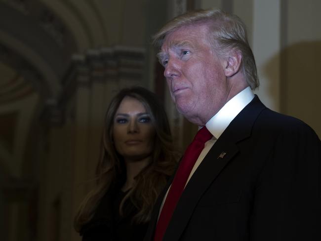 President-elect Donald Trump, accompanied by his wife Melania, speaks to the media on Capitol Hill in Washington, Thursday, Nov. 10, 2016, following a meeting with Senate Majority Leader Mitch McConnell of Ky. (AP Photo/Molly Riley)