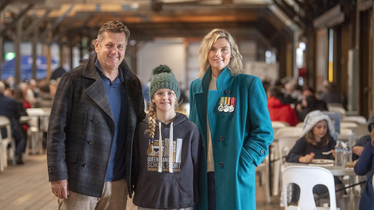 (from left) Jason, Elizabeth and Jasmine Riddle enjoyed the Gunfire breakfast at The Goods Shed on ANZAC DAY. Tuesday, April 25, 2023. Picture: Nev Madsen.