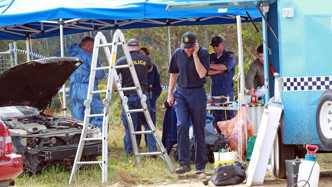 Tasmania police search for clues at Bagdad.