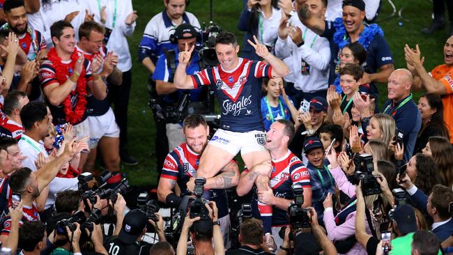 Cooper Cronk celebrates the Roosters’ incredible grand final success last year.