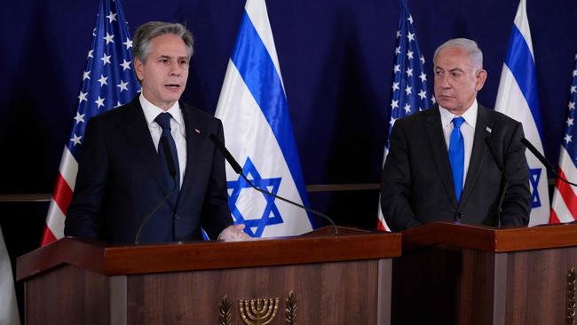 Israeli Prime Minister Benjamin Netanyahu (R) looks on as US Secretary of State Antony Blinken gives statements to the media in Tel Aviv. Picture: AFP.