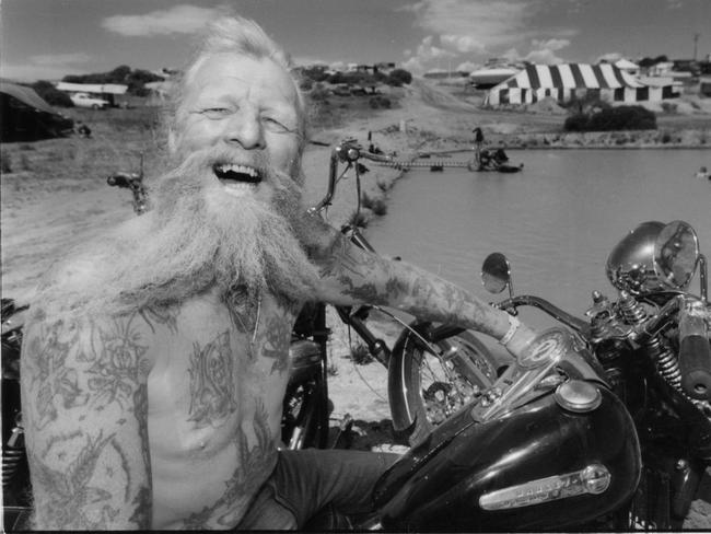 Moses, from Jervois, on his 1947 Flathead Harley Davidson motorcycle at Ponde rock music festival, held by the Hell's Angels Motorcycle Club in Ponde near Mannum, SA, 19 Feb 1993.