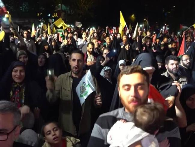 Iranians celebrate in Tehran after missile strikes on Israel