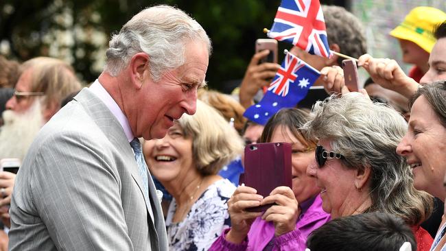 (FILES) Prince Charles is greeted by members of the public during a visit to Brisbane on April 4, 2018. King Charles III this week begins his first tour of Australia as monarch, reigniting debate about whether the country should sever ties with the British monarchy and become a republic. (Photo by DAN PELED / POOL / AFP)