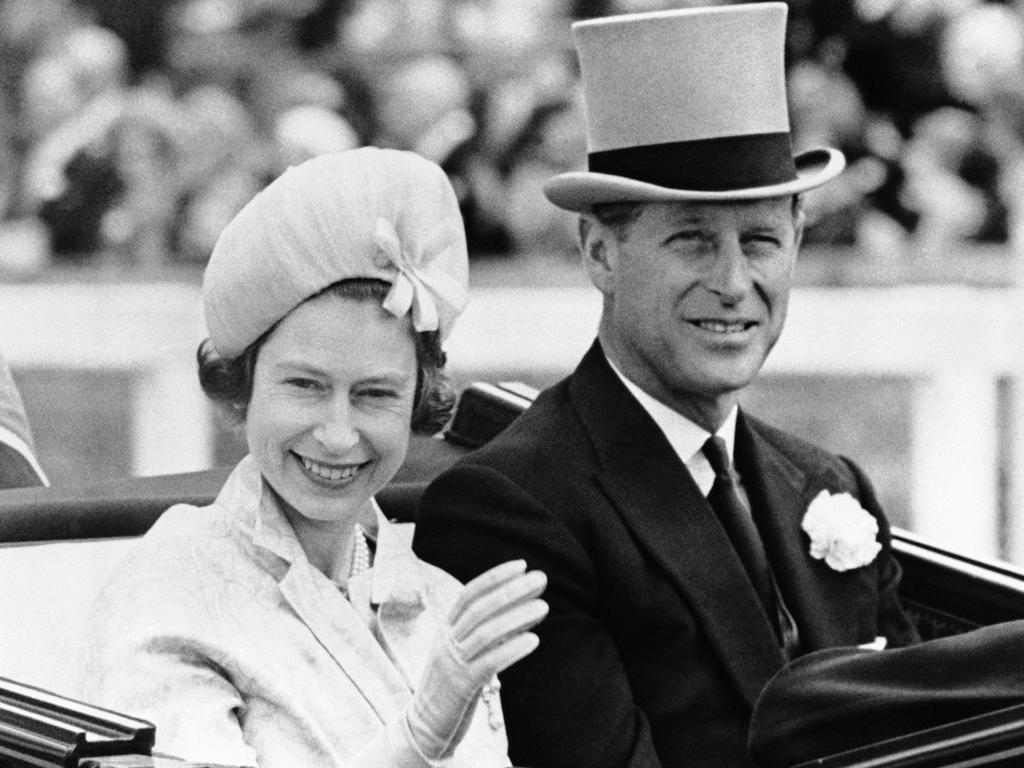 Britain's Prince Philip and his wife Queen Elizabeth II arrive at Royal Ascot race meeting in 1962. Picture: AP Photo/File.