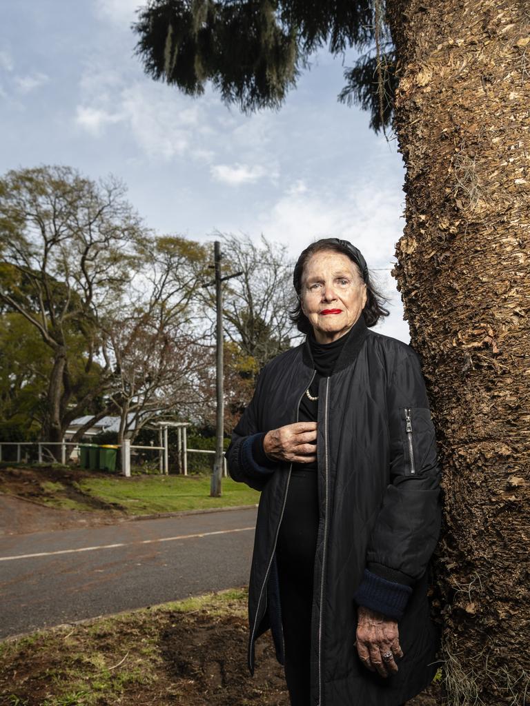 Diana Clift, standing near a tree she planted in the 80s, is upset by the amount of trees being cut down and cut back in her Redwood neighbourhood. Picture: Kevin Farmer