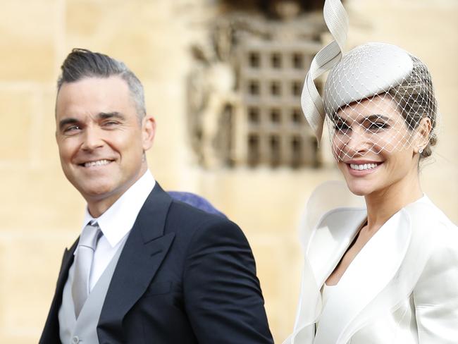 WINDSOR, ENGLAND - OCTOBER 12: Robbie Williams and his wife Ayda Field arrive ahead of the wedding of Princess Eugenie of York and Mr. Jack Brooksbank at St. George's Chapel on October 12, 2018 in Windsor, England. (Photo by Alastair Grant - WPA Pool/Getty Images)