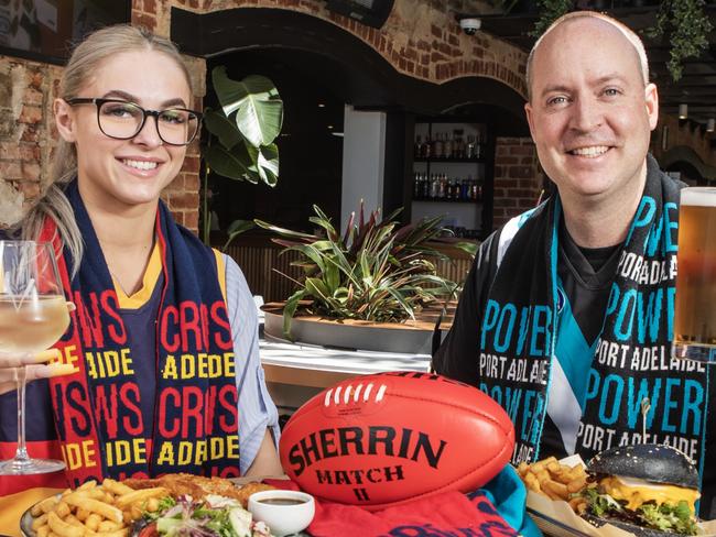 Lauren Green and Tim Riemann from the Strathmore Hotel are excited about the return of the AFL Football Season, 10 March 2023. Picture Simon Cross