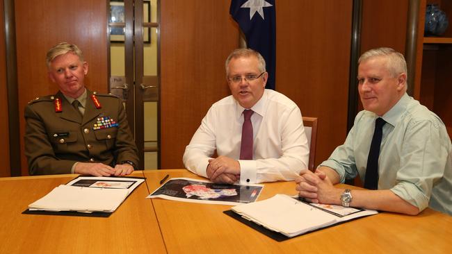 National Drought co-ordinator Major General Stephan Day meeting with PM Scott Morrison and Deputy PM Michael McCormack at Parliament House in Canberra. Picture: Kym Smith