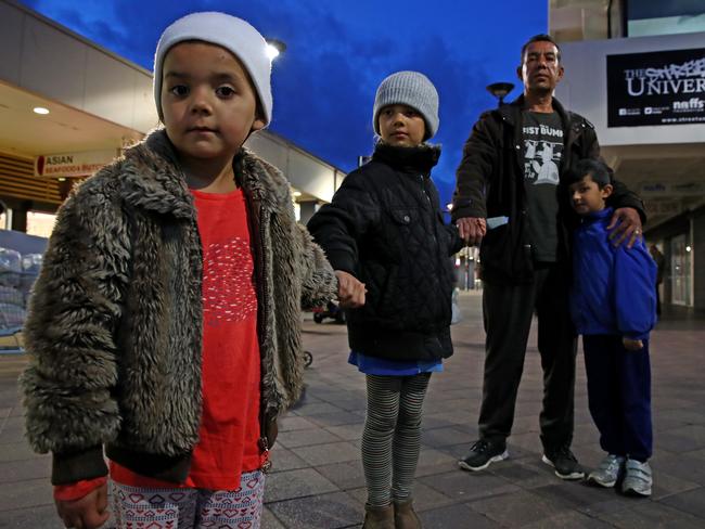 Mount Druitt dad Khaja Khazada with kids Safa 5, Marwa 8 and Ibrahim 7, says he is scared to take his kids out after dark. Picture: Toby Zerna