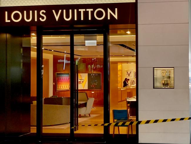 MELBOURNE, AUSTRALIA - NewsWire Photos MARCH 23, 2025: Damage has been covered up after the Louis Vuitton store at Crown Casino was ram raided early this morning. Picture: NewsWire / Andrew Henshaw