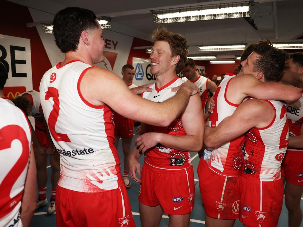 The Swans captain was mobbed by teammates after the match as they celebrated the big win. Picture: Matt King/Getty Images