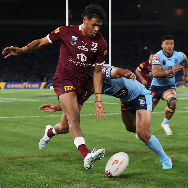 SYDNEY, AUSTRALIA - JUNE 08: Selwyn Cobbo of the Maroons kicks forward for the try to Dane Gagai of the Maroons during game one of the 2022 State of Origin series between the New South Wales Blues and the Queensland Maroons at Accor Stadium on June 08, 2022, in Sydney, Australia. (Photo by Mark Kolbe/Getty Images)