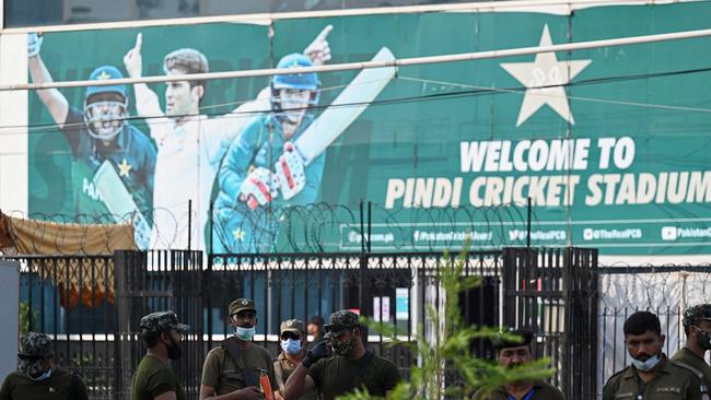 Policemen stand guard outside the Rawalpindi Cricket Stadium after New Zealand withdrew from a series of one-day internationals. Picture: AFP