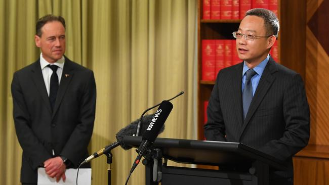 Victoria and Tasmania Consul-General of China Long Zhou speaks as Greg Hunt listens. Picture: AAP.