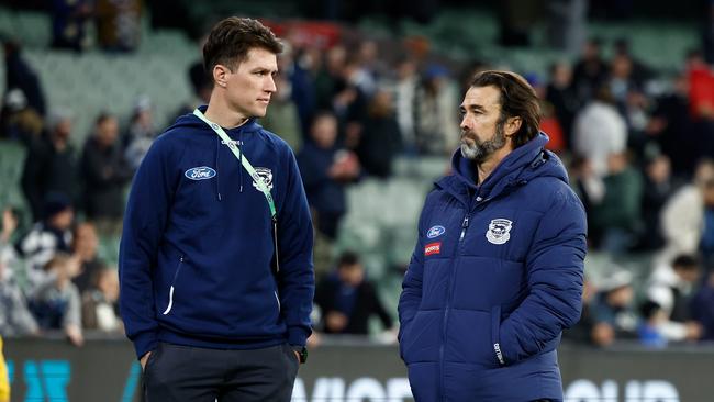 Mackie and Scott in discussion post-game after their win over Collingwood (Photo by Michael Willson/AFL Photos via Getty Images)