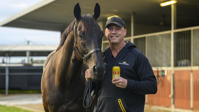 Champion trainer Tony Gollan with his star horse Antino ahead of next week’s showdown with Pride Of Jenni in the Group 1 Doomben Cup, where the Brisbane Racing Club will shout a free XXXX if either wins. Picture: Michael McInally