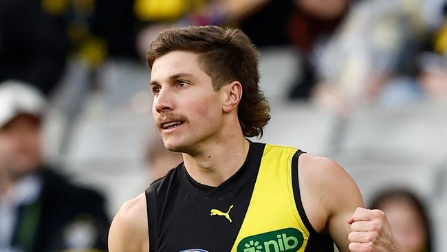 MELBOURNE, AUSTRALIA - JUNE 30: Liam Baker of the Tigers celebrates a goal during the 2024 AFL Round 16 match between the Richmond Tigers and the Carlton Blues at The Melbourne Cricket Ground on June 30, 2024 in Melbourne, Australia. (Photo by Michael Willson/AFL Photos via Getty Images)